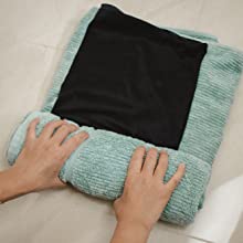 rolling up silk pillowcase in towel