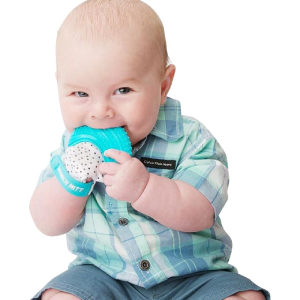 baby chewing on blue munch mitt